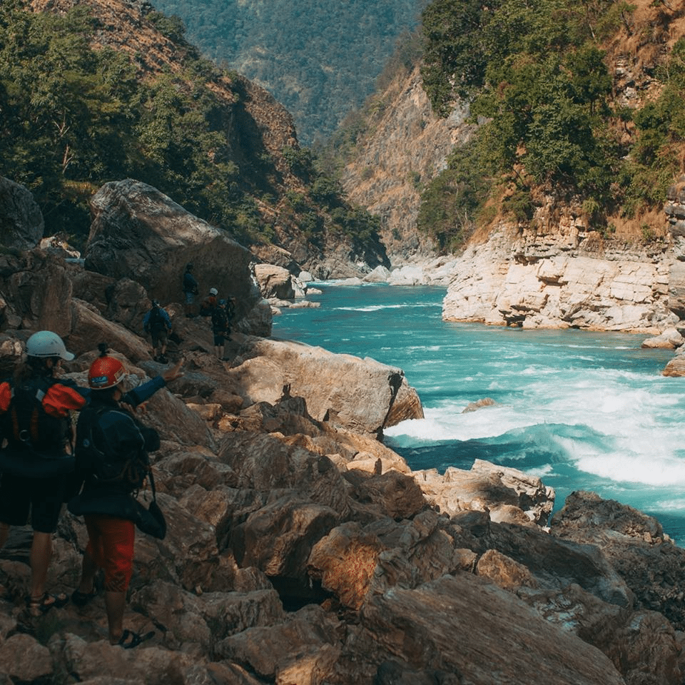 (Join Adventures Team favorite office, Karnali River. Laura and Dipesh scouting the line on Juicer Rapid. photographer Owen Fisher)