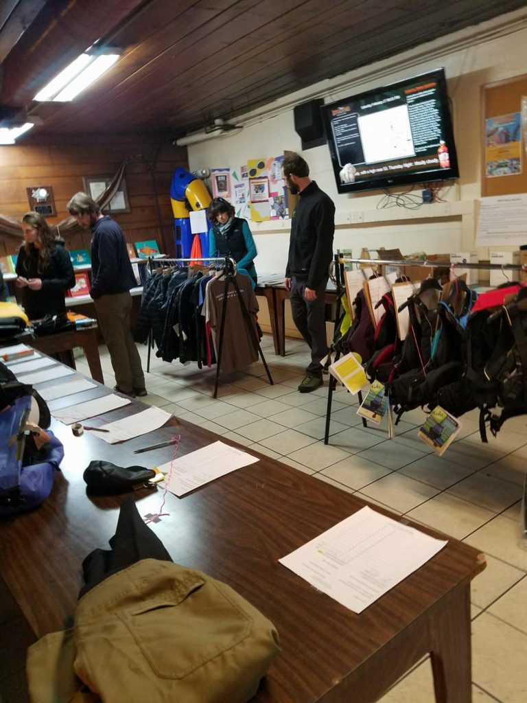 Participants searching the silent auction.